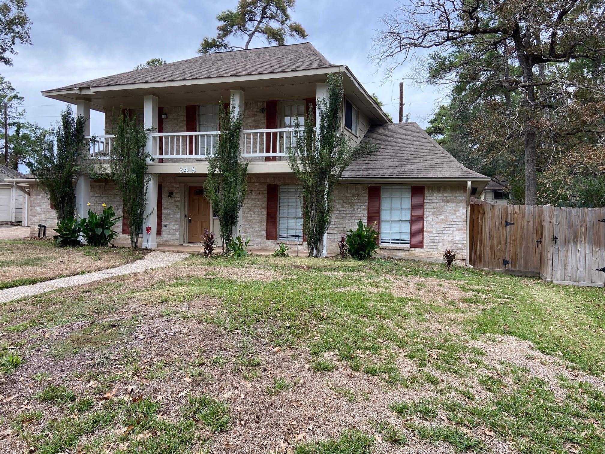 3418 Candlewisp Drive Spring, TX 77388 - Photo 1 of 16 a front view of a house with garden