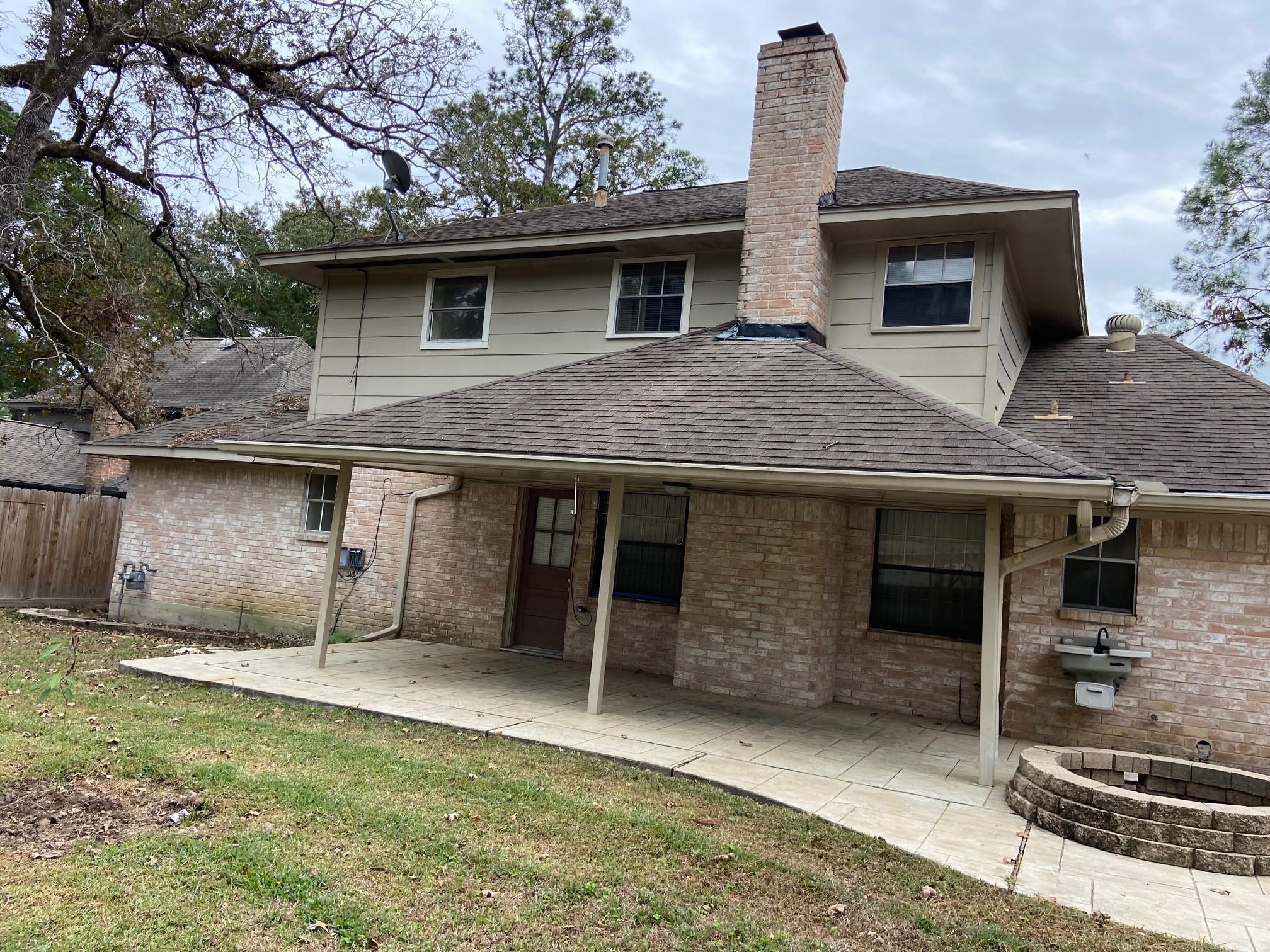 3418 Candlewisp Drive Spring, TX 77388 - Photo 13 of 16 a front view of a house with garden