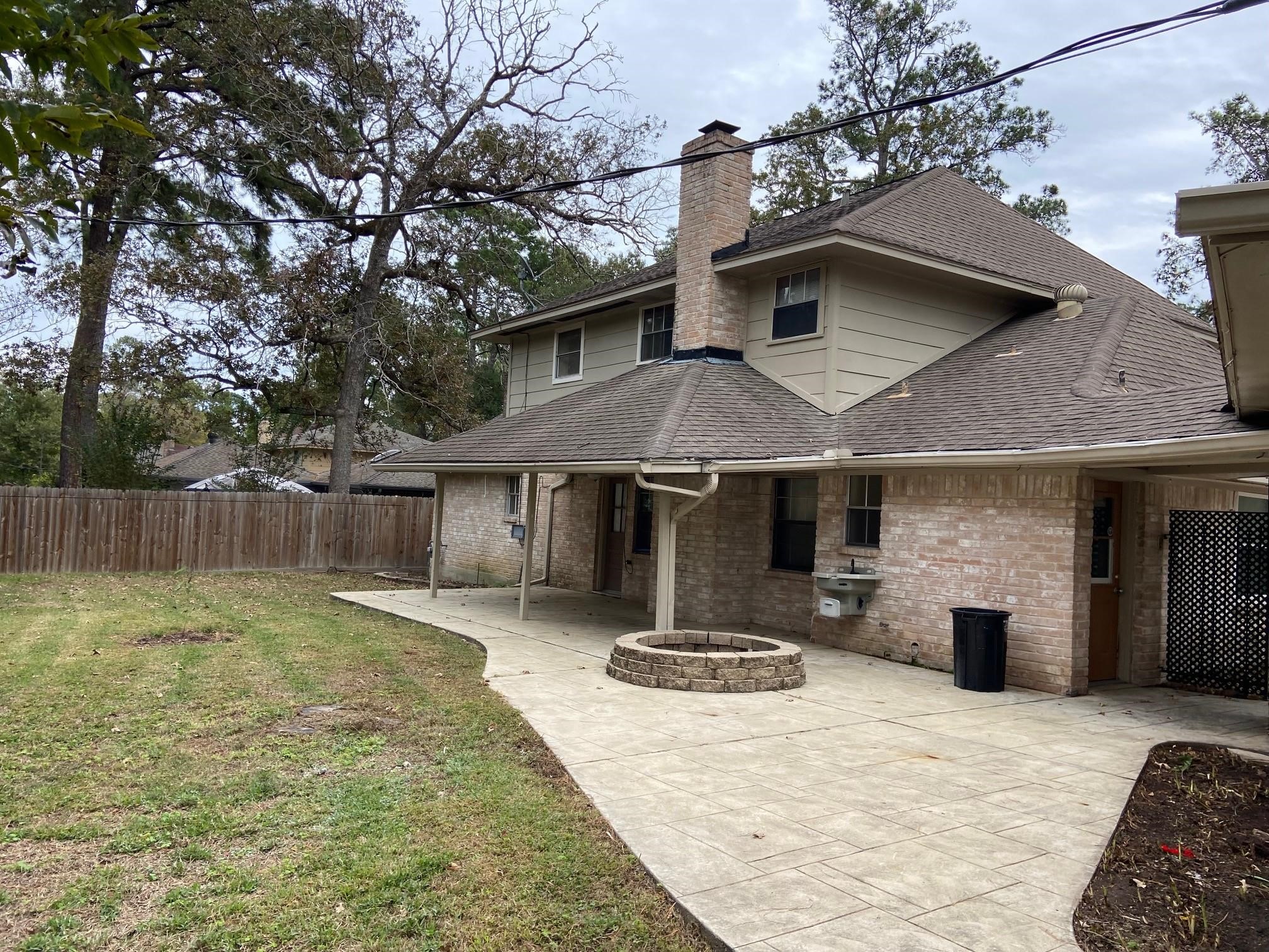 3418 Candlewisp Drive Spring, TX 77388 - Photo 14 of 16 a front view of a house with a yard