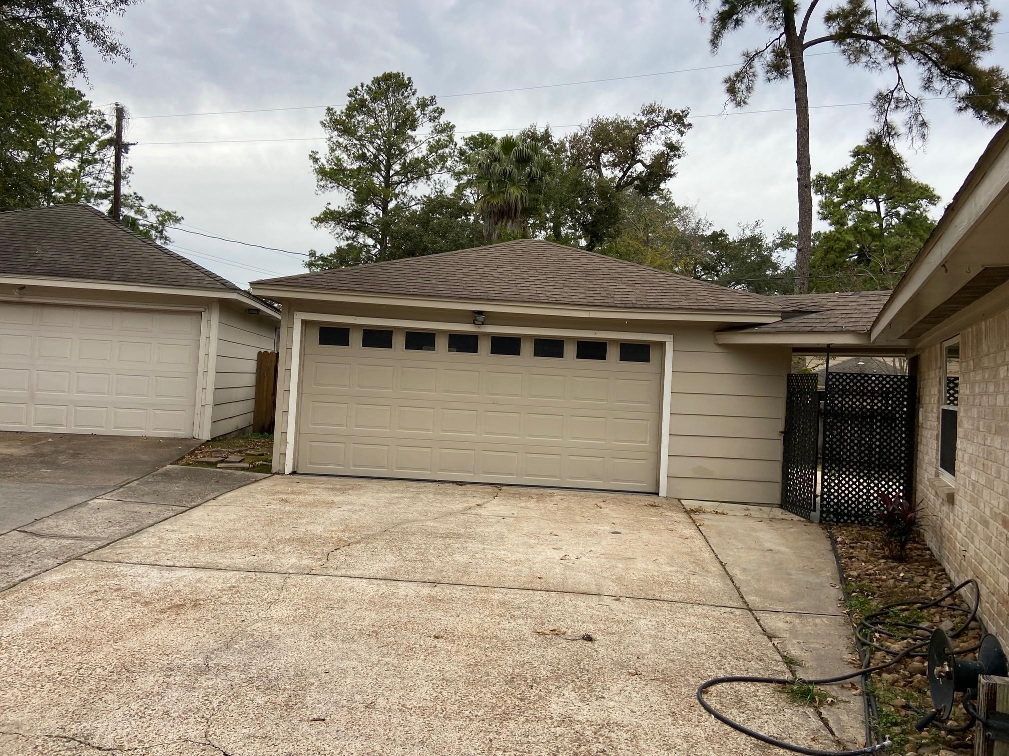 3418 Candlewisp Drive Spring, TX 77388 - Photo 15 of 16 a house with trees in the background