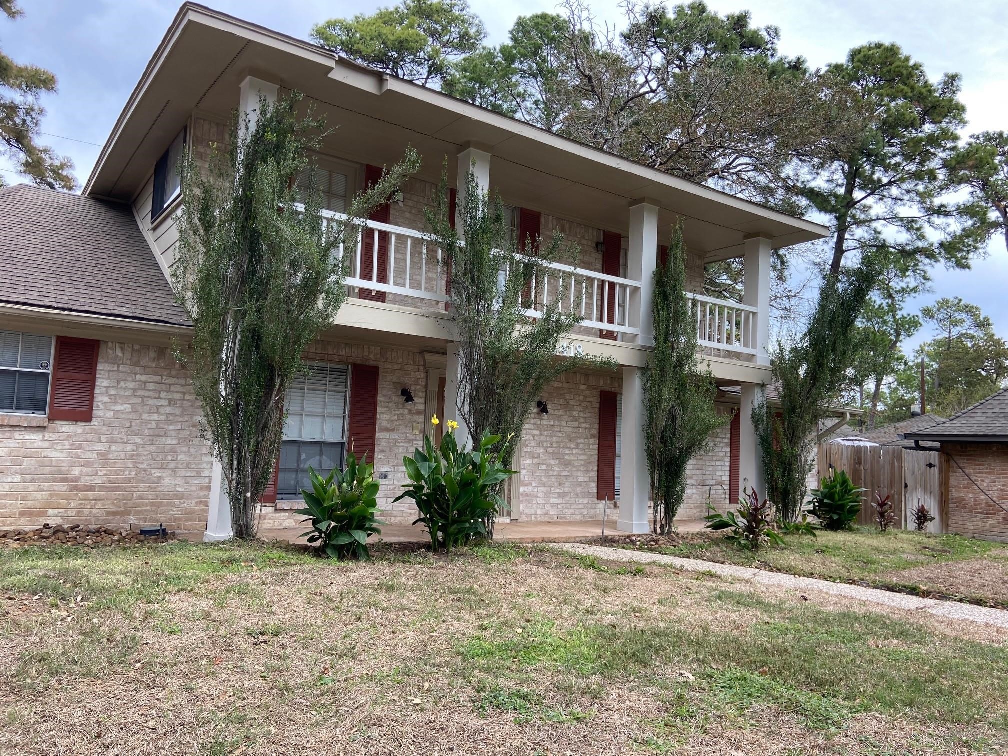 3418 Candlewisp Drive Spring, TX 77388 - Photo 2 of 16 a front view of a house with garden