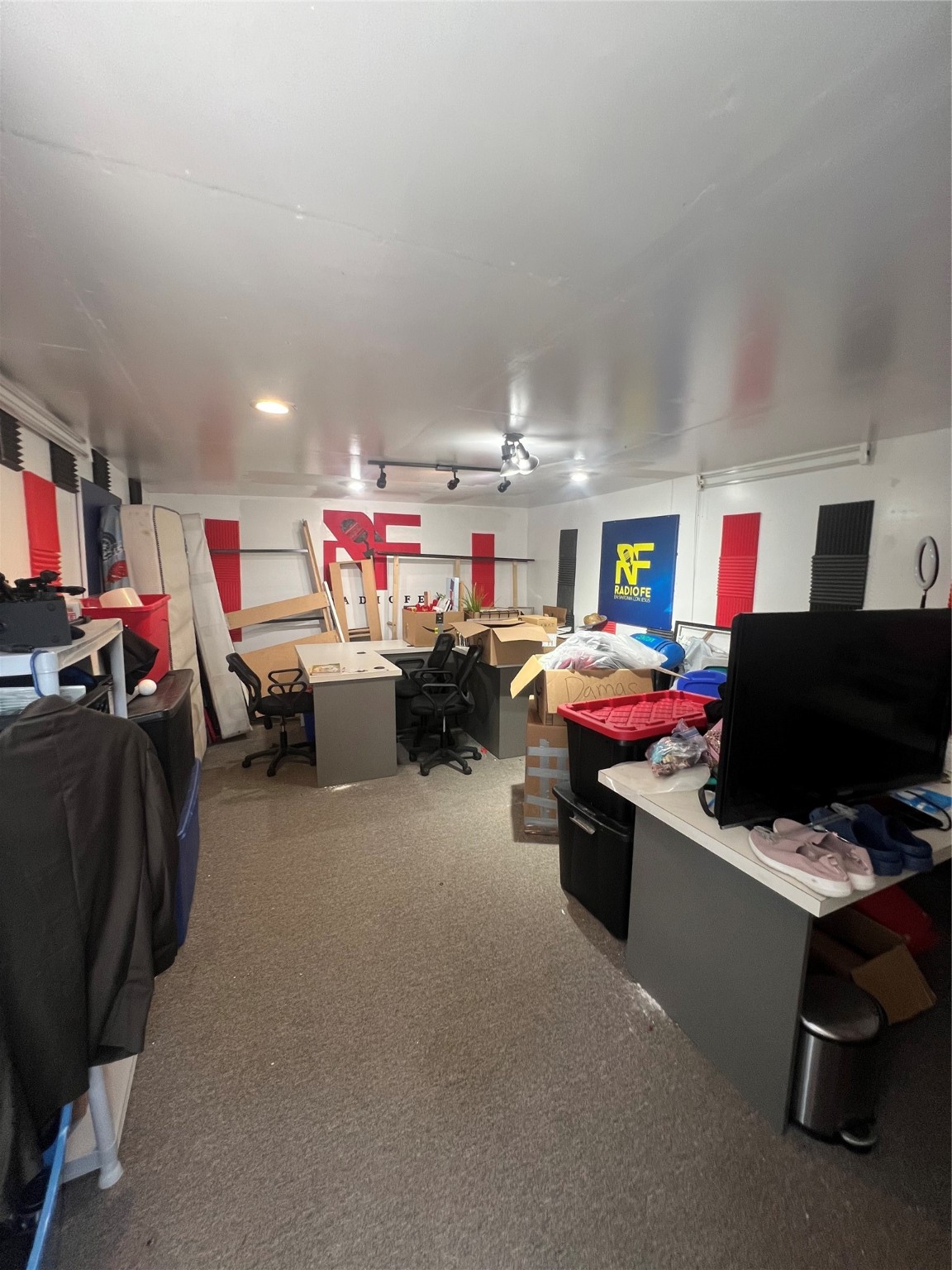 4118 Ebbtide Drive Houston, TX 77045 - Photo 12 of 14 a living room with lots of furniture and clutter