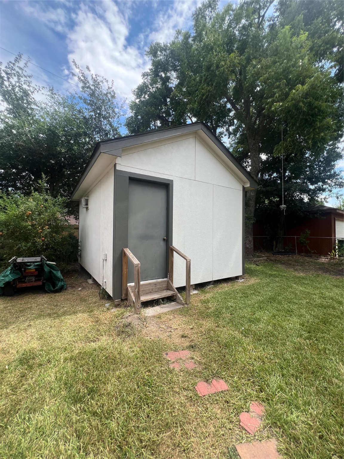 4118 Ebbtide Drive Houston, TX 77045 - Photo 13 of 14 a view of backyard of house with green space