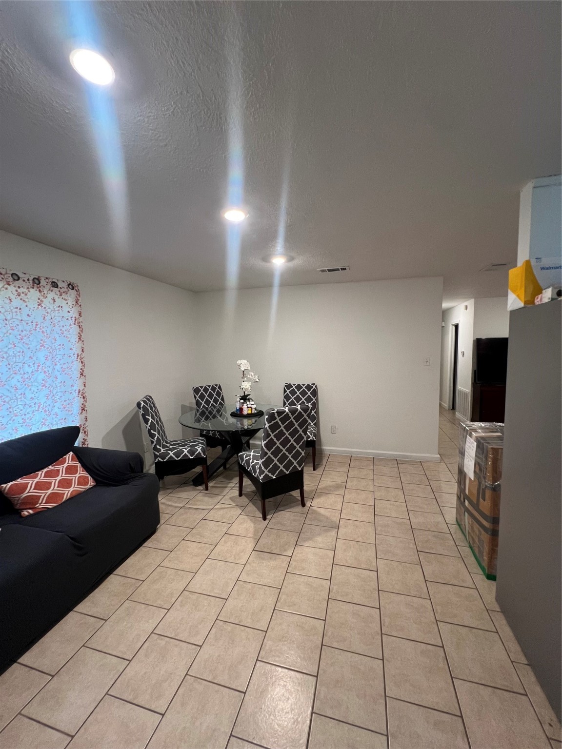 4118 Ebbtide Drive Houston, TX 77045 - Photo 4 of 14 a bed room with two beds and a couch