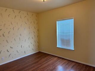 355 Colver Road, Unit 24 Talent, OR 97540 - Photo 14 of 21 a view of a small space with wooden floor and a window