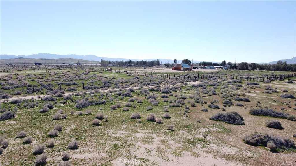 0 Yucca Road Newberry Springs, CA 92365 - Photo 10 of 20 a view of a lake with mountains in the background