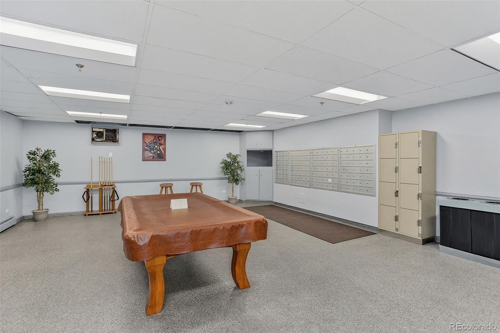 955 Eudora Street, Unit 1601 Denver, CO 80220 - Photo 32 of 36 a room with furniture and window