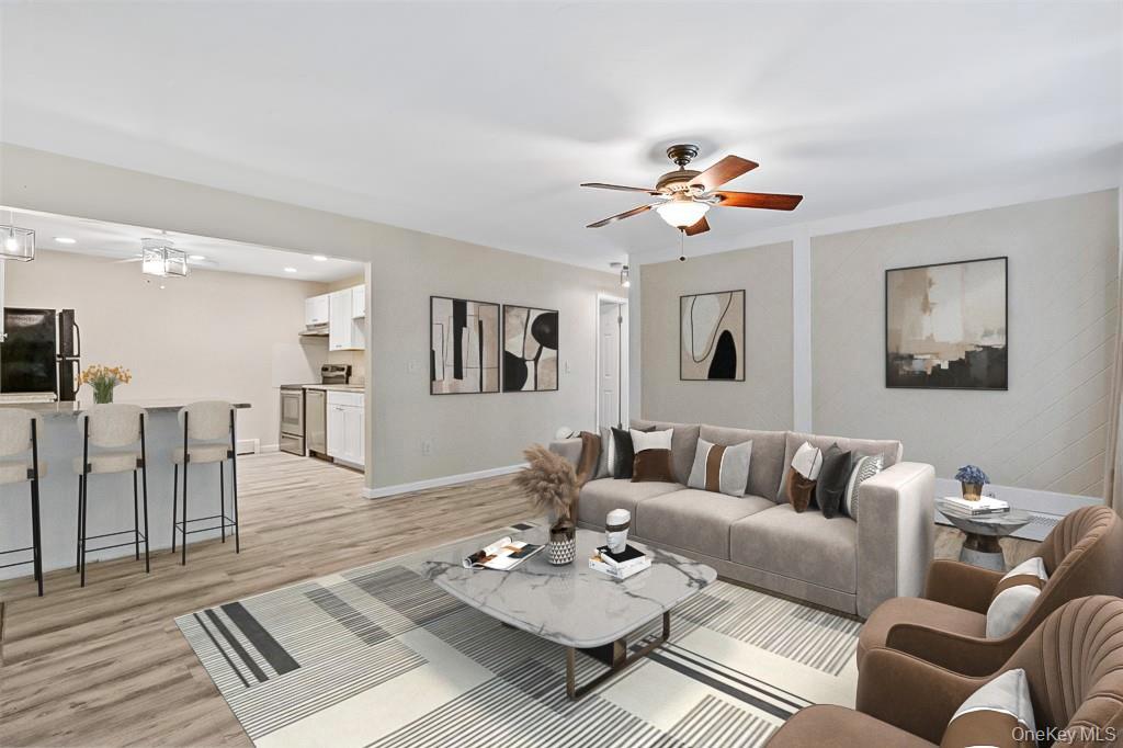 68 Gerald Drive, Unit D1 Poughkeepsie, NY 12601 - Photo 4 of 29 Living area with ceiling fan, light wood-type flooring, and recessed lighting
