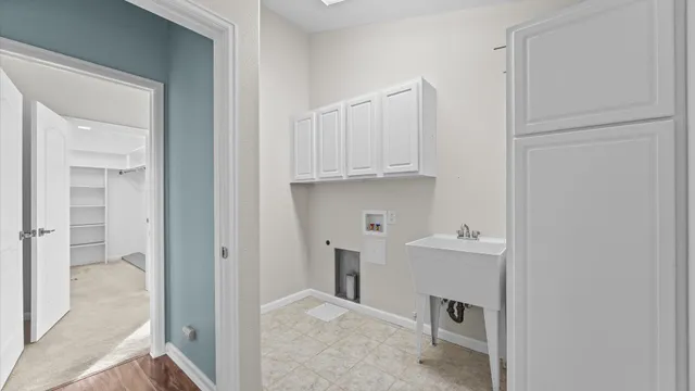 a view of kitchen and utility room