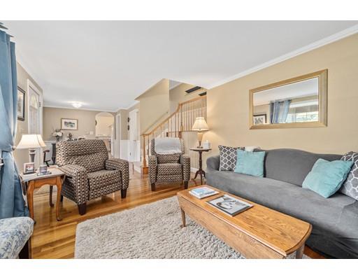 31 Merilyn Road Weymouth, MA 02190 - Photo 12 of 25 a living room with furniture and a rug