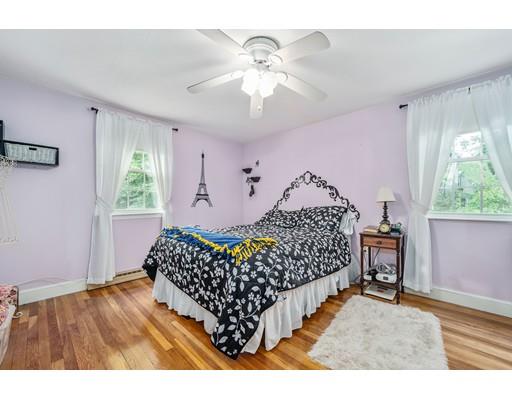 31 Merilyn Road Weymouth, MA 02190 - Photo 13 of 25 a bedroom with a bed and a window