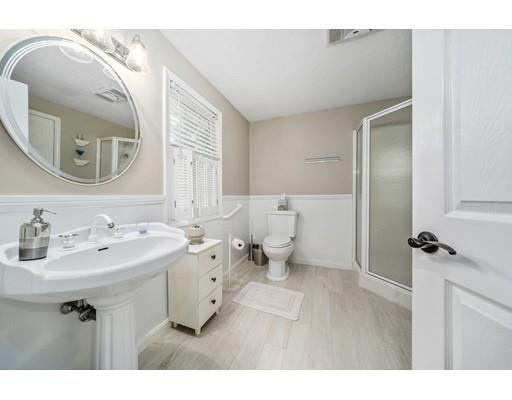 31 Merilyn Road Weymouth, MA 02190 - Photo 21 of 25 a bathroom with a sink and a mirror