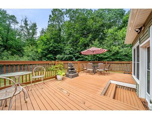 31 Merilyn Road Weymouth, MA 02190 - Photo 22 of 25 a view of a chairs and table on the wooden floor