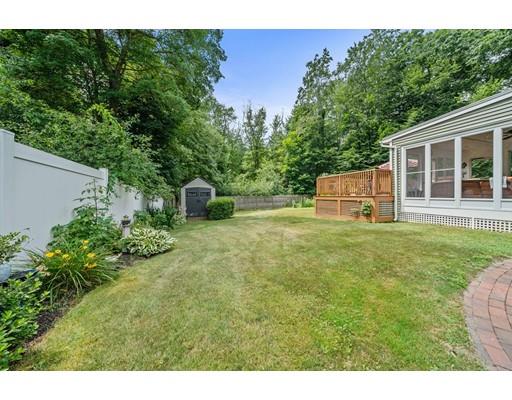 31 Merilyn Road Weymouth, MA 02190 - Photo 23 of 25 a backyard of a house with table and chairs