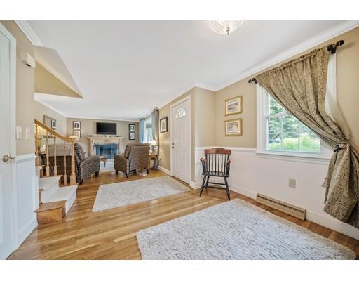 31 Merilyn Road Weymouth, MA 02190 - Photo 10 of 25 a living room with furniture and a wooden floor