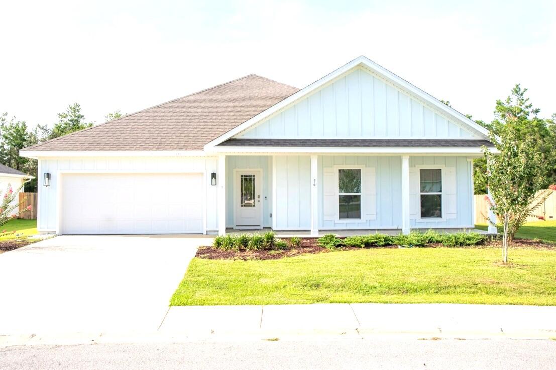 56 Secluded Circle Freeport, FL 32439 - Photo 1 of 26 a view of front of house with yard