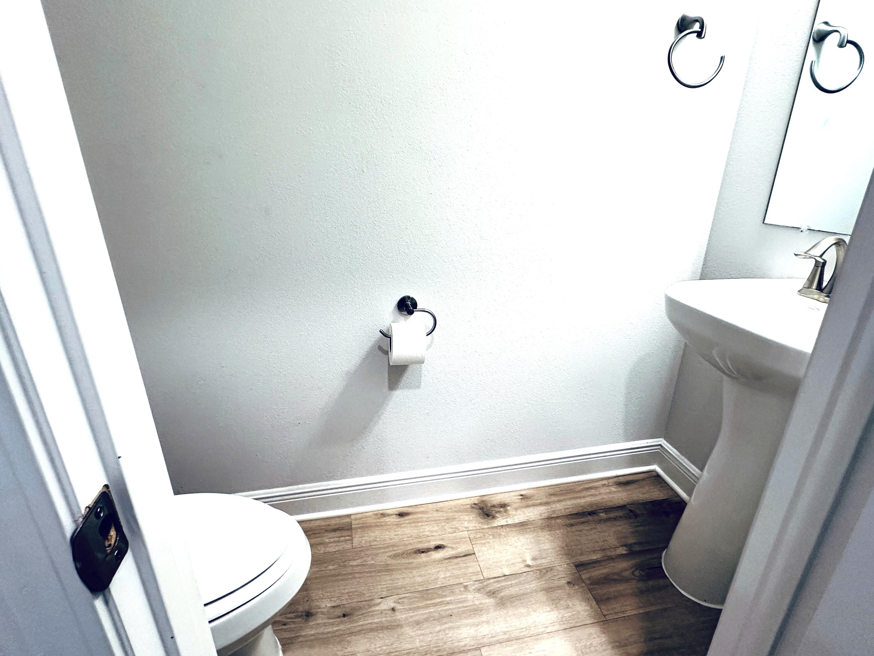 56 Secluded Circle Freeport, FL 32439 - Photo 13 of 26 a bathroom with a sink and toilet