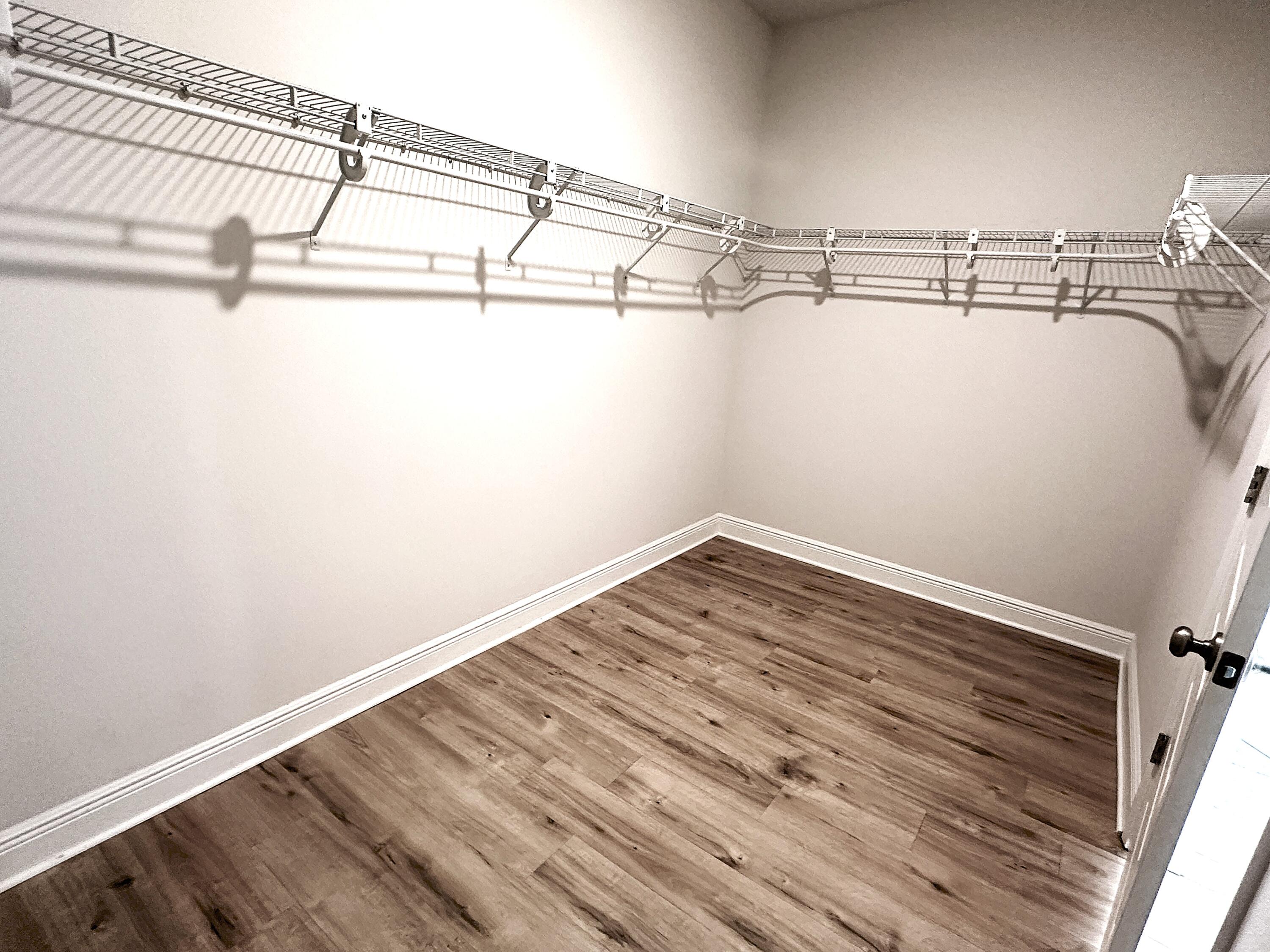 56 Secluded Circle Freeport, FL 32439 - Photo 22 of 26 a view of a room with racks on the wall