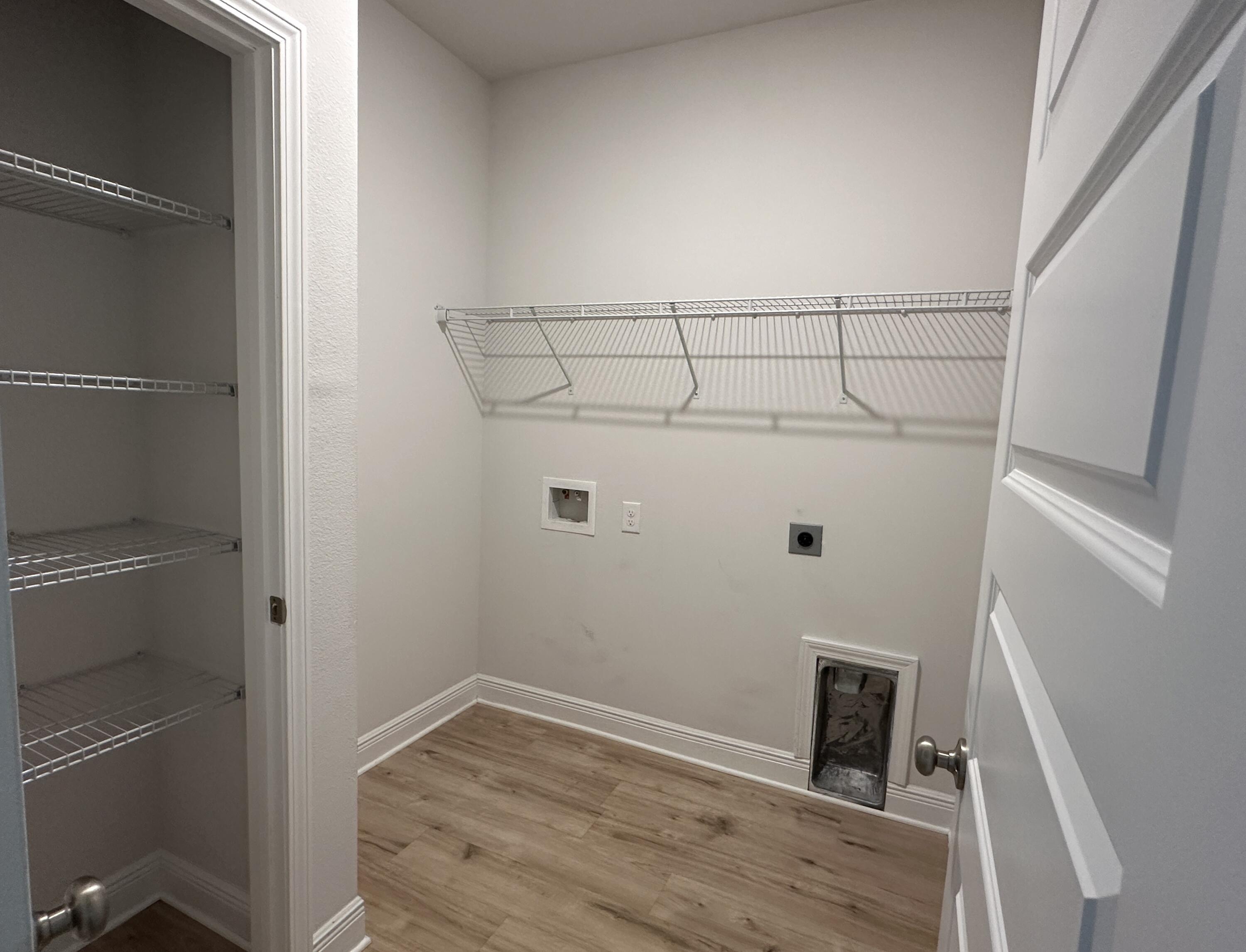 56 Secluded Circle Freeport, FL 32439 - Photo 7 of 26 a view of a room with wooden floor