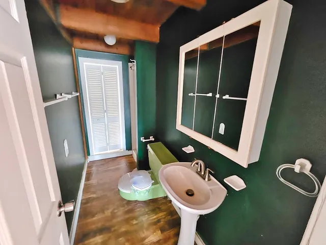 a bathroom with a tub and shower