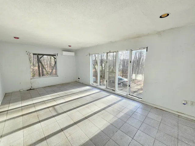 a view of entryway with white walls
