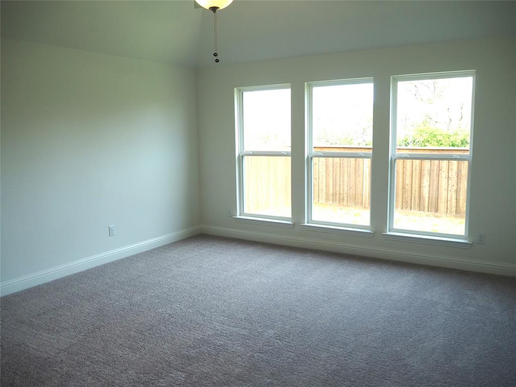2201 Yellowhammer Road Denton, TX 76205 - Photo 13 of 36 an empty room with a window
