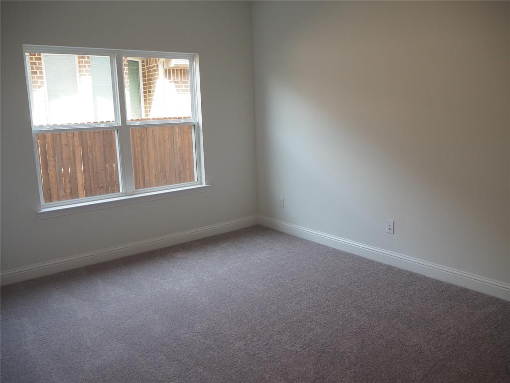 2201 Yellowhammer Road Denton, TX 76205 - Photo 22 of 36 an empty room with a window