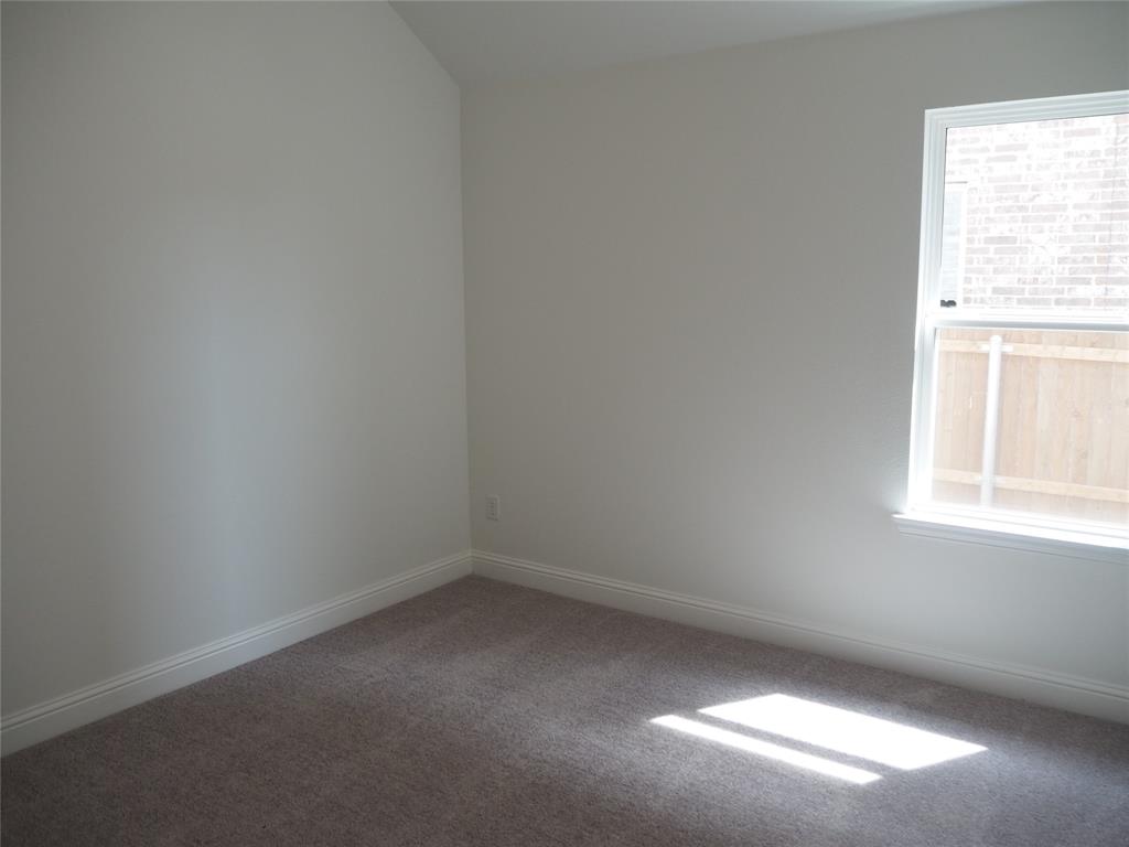 2201 Yellowhammer Road Denton, TX 76205 - Photo 24 of 36 an empty room with a window