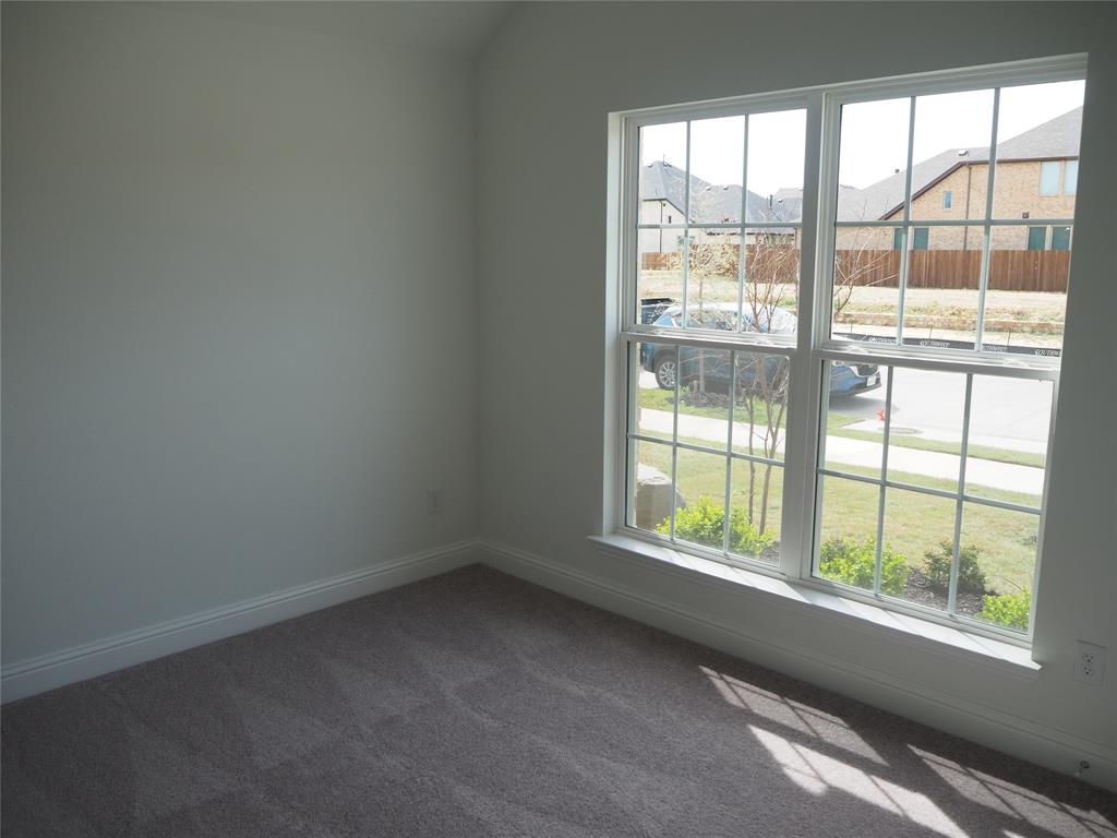 2201 Yellowhammer Road Denton, TX 76205 - Photo 26 of 36 a view of an empty room with a window