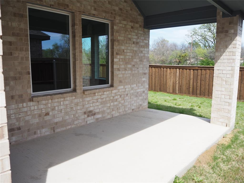 2201 Yellowhammer Road Denton, TX 76205 - Photo 30 of 36 a view of back yard of the house