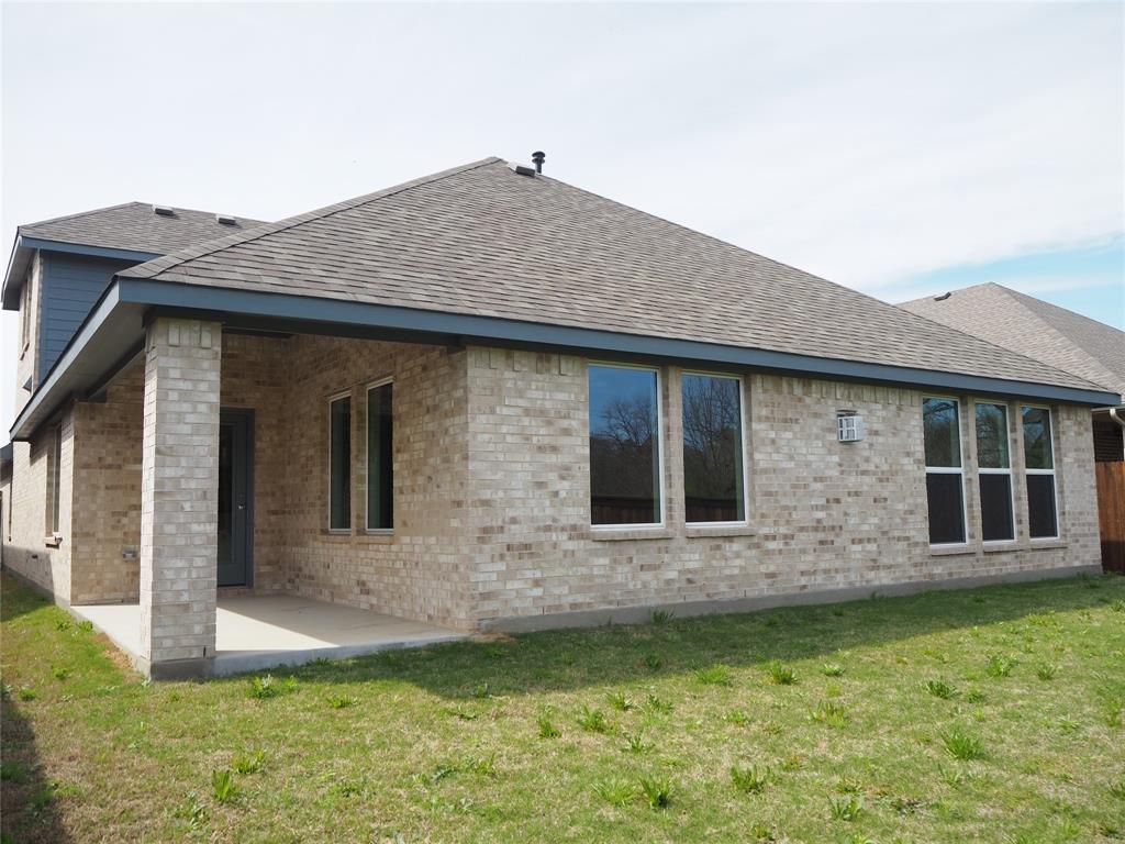 2201 Yellowhammer Road Denton, TX 76205 - Photo 34 of 36 a front view of house with yard