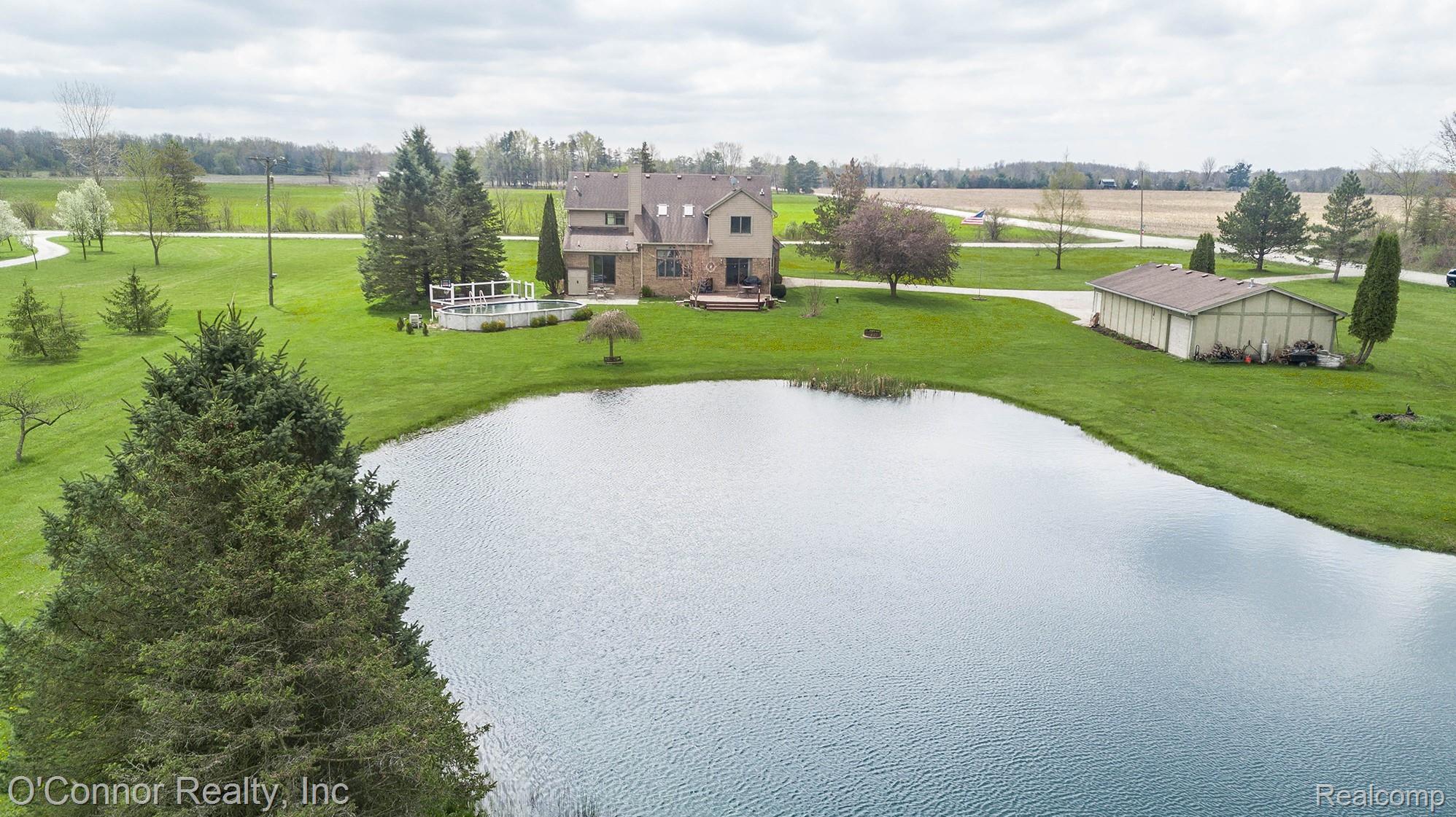 7978 Frith Road Columbus, MI 48063 - Photo 51 of 56 Drone / aerial view of a large body of water