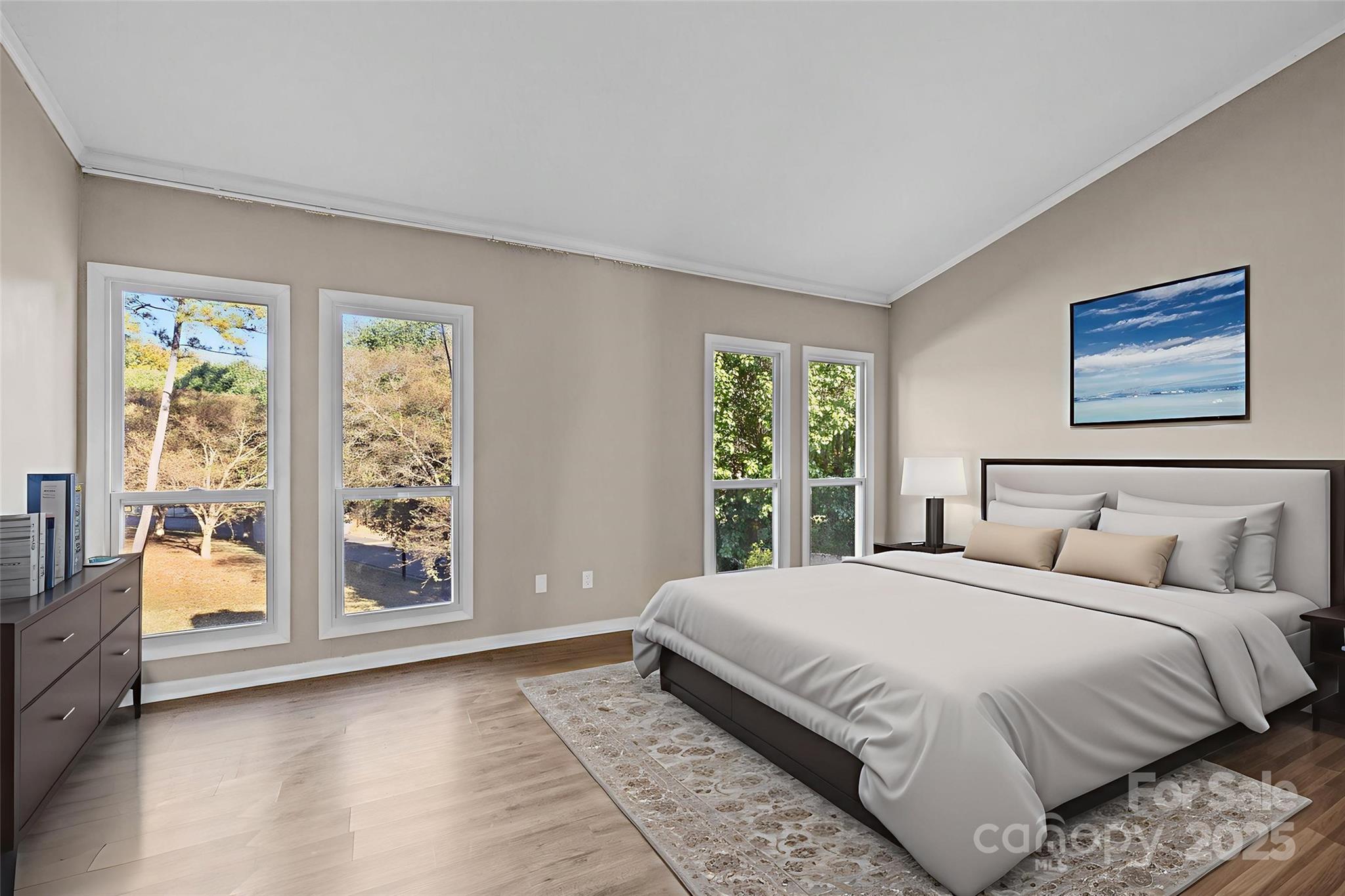 7939 Charter Oak Lane Charlotte, NC 28226 - Photo 16 of 28 a bedroom with a large bed and a window