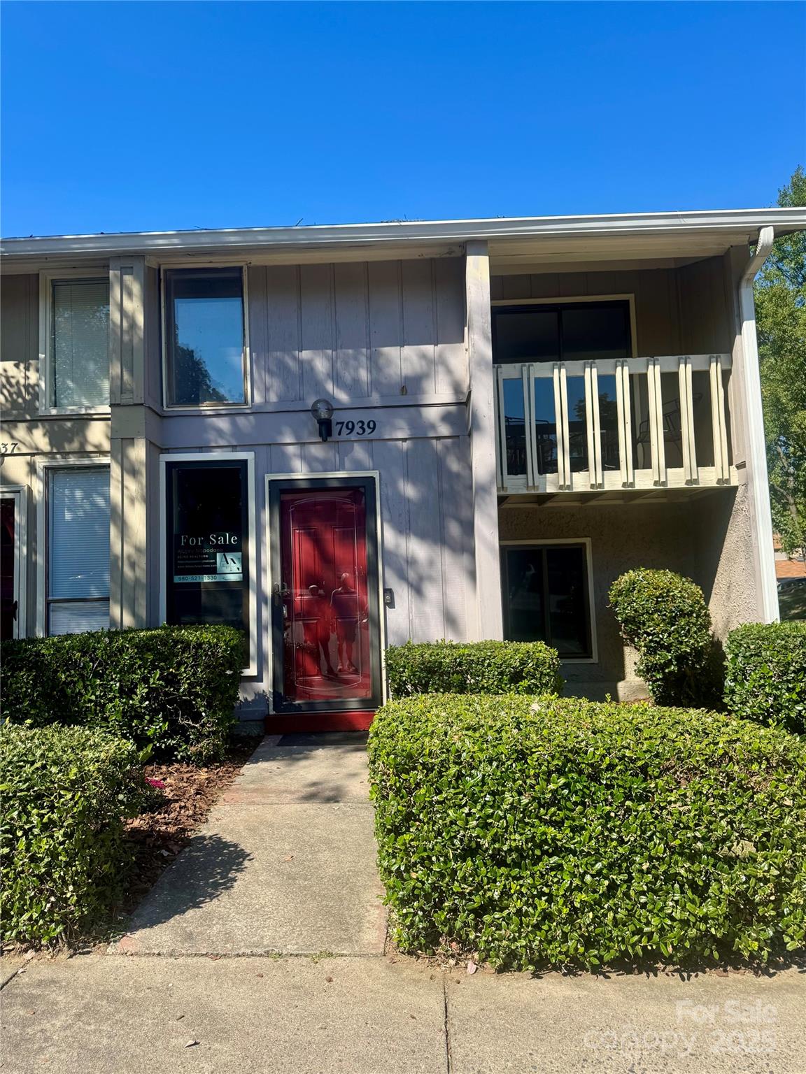 7939 Charter Oak Lane Charlotte, NC 28226 - Photo 2 of 28 a front view of a house with a yard