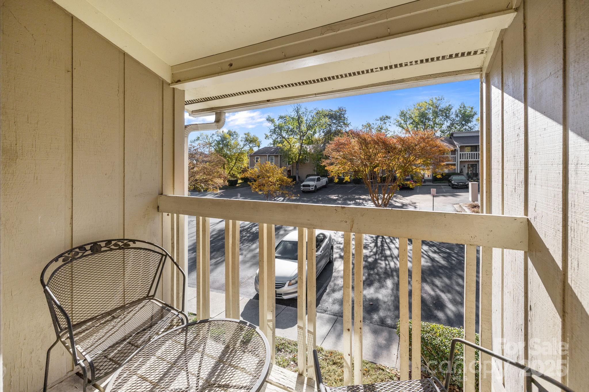 7939 Charter Oak Lane Charlotte, NC 28226 - Photo 23 of 28 a view of a balcony with furniture