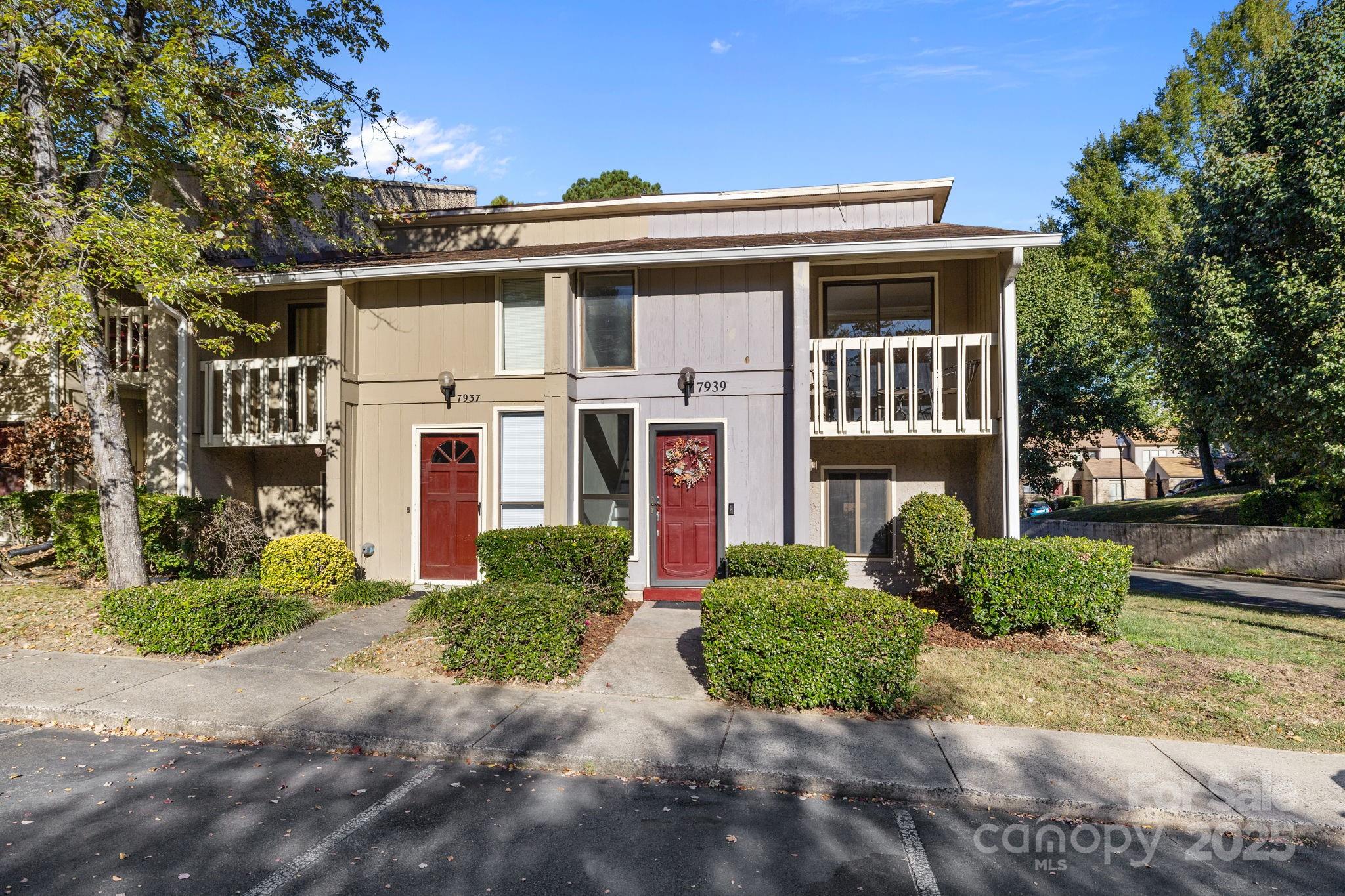7939 Charter Oak Lane Charlotte, NC 28226 - Photo 3 of 28 front view of a house with a yard