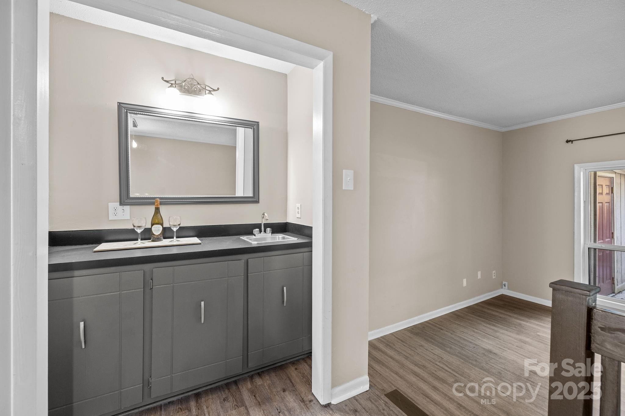 7939 Charter Oak Lane Charlotte, NC 28226 - Photo 9 of 28 a bathroom with a sink and two mirror