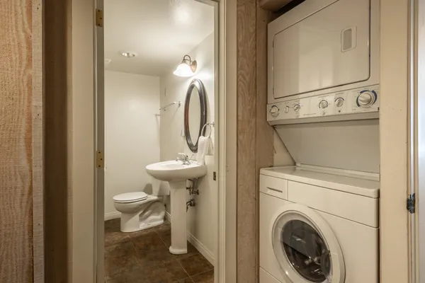 a bathroom with a toilet and a sink
