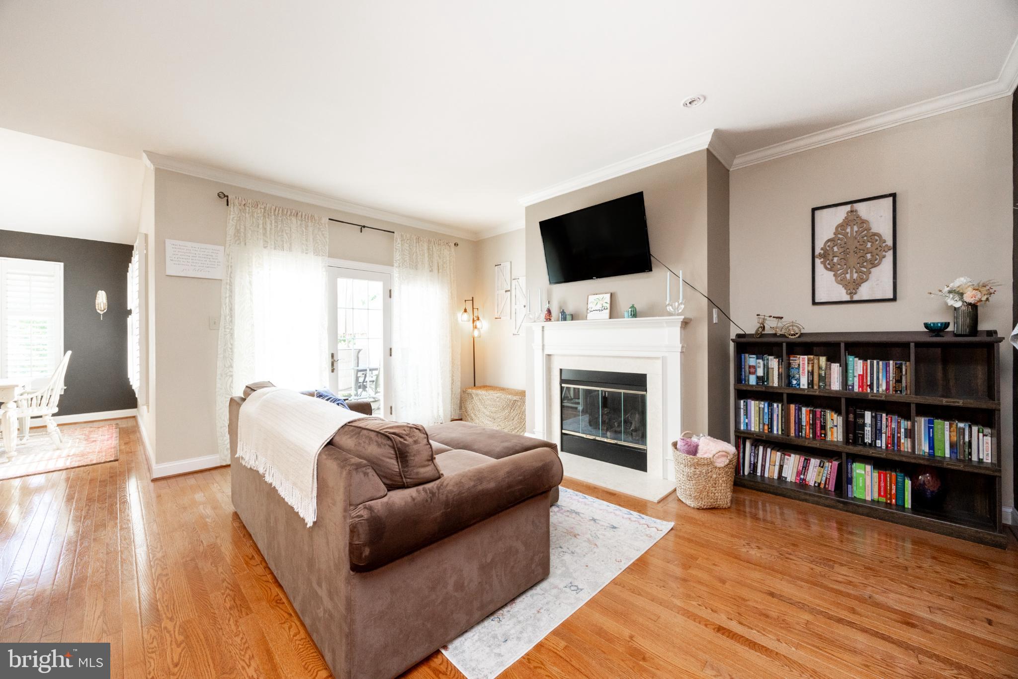 214 Windgate Drive Chester Springs, PA 19425 - Photo 12 of 45 a living room with furniture fireplace and flat screen tv