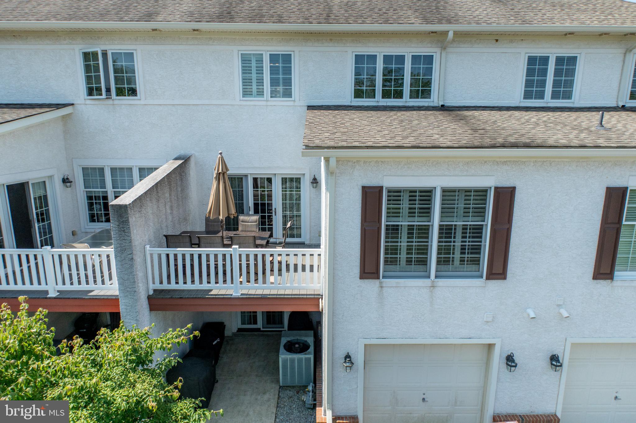 214 Windgate Drive Chester Springs, PA 19425 - Photo 38 of 45 a front view of a house with a garden