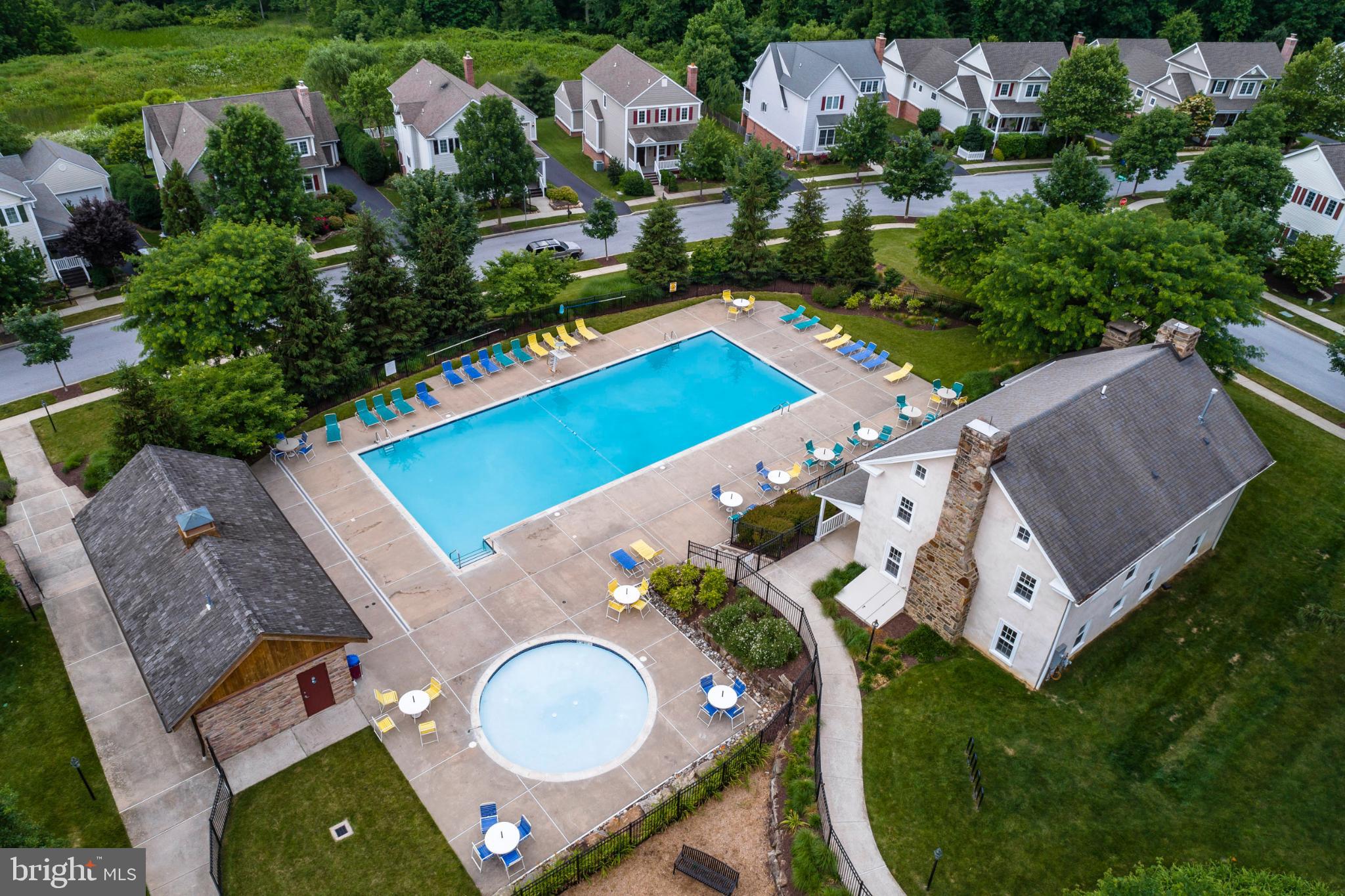 214 Windgate Drive Chester Springs, PA 19425 - Photo 41 of 45 an aerial view of a house swimming pool a yard and outdoor seating