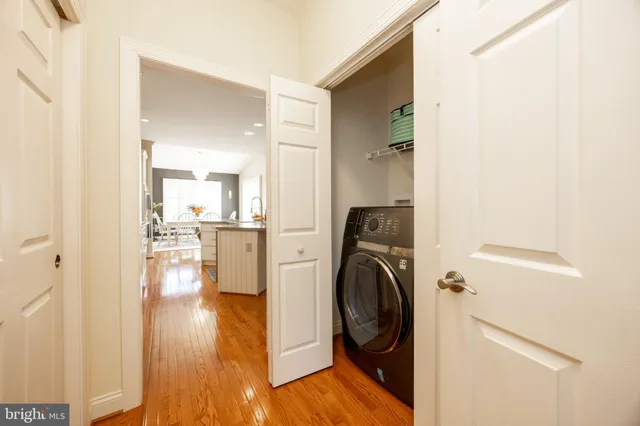 a view of a kitchen with washer and dryer