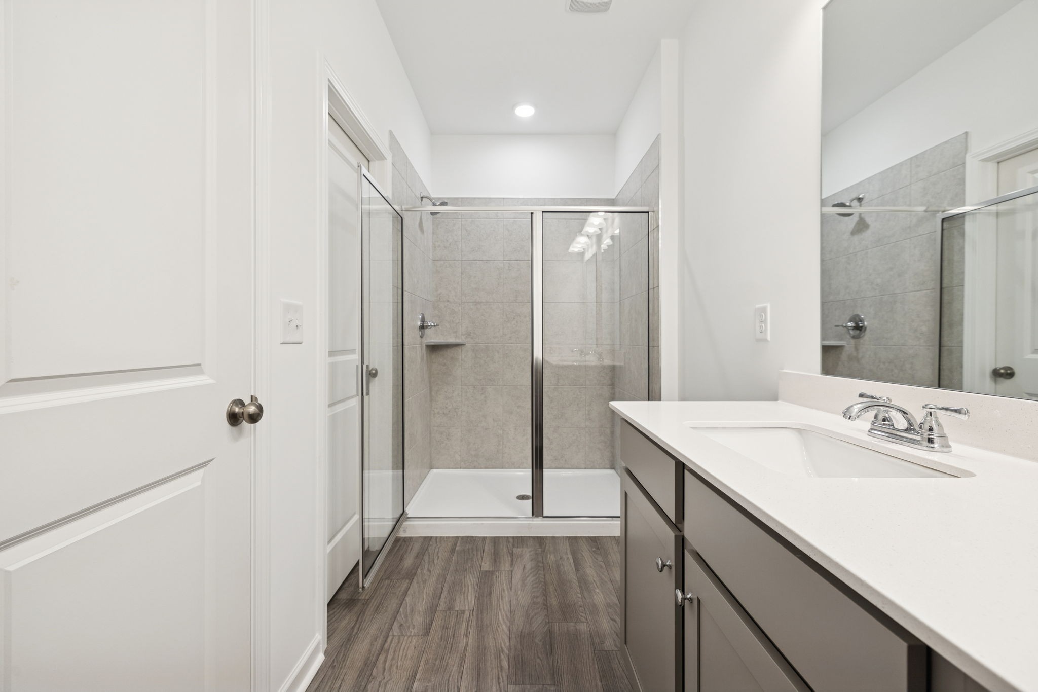 129 Ironhorse Way Dickson, TN 37055 - Photo 14 of 35 a bathroom with a sink a toilet and shower