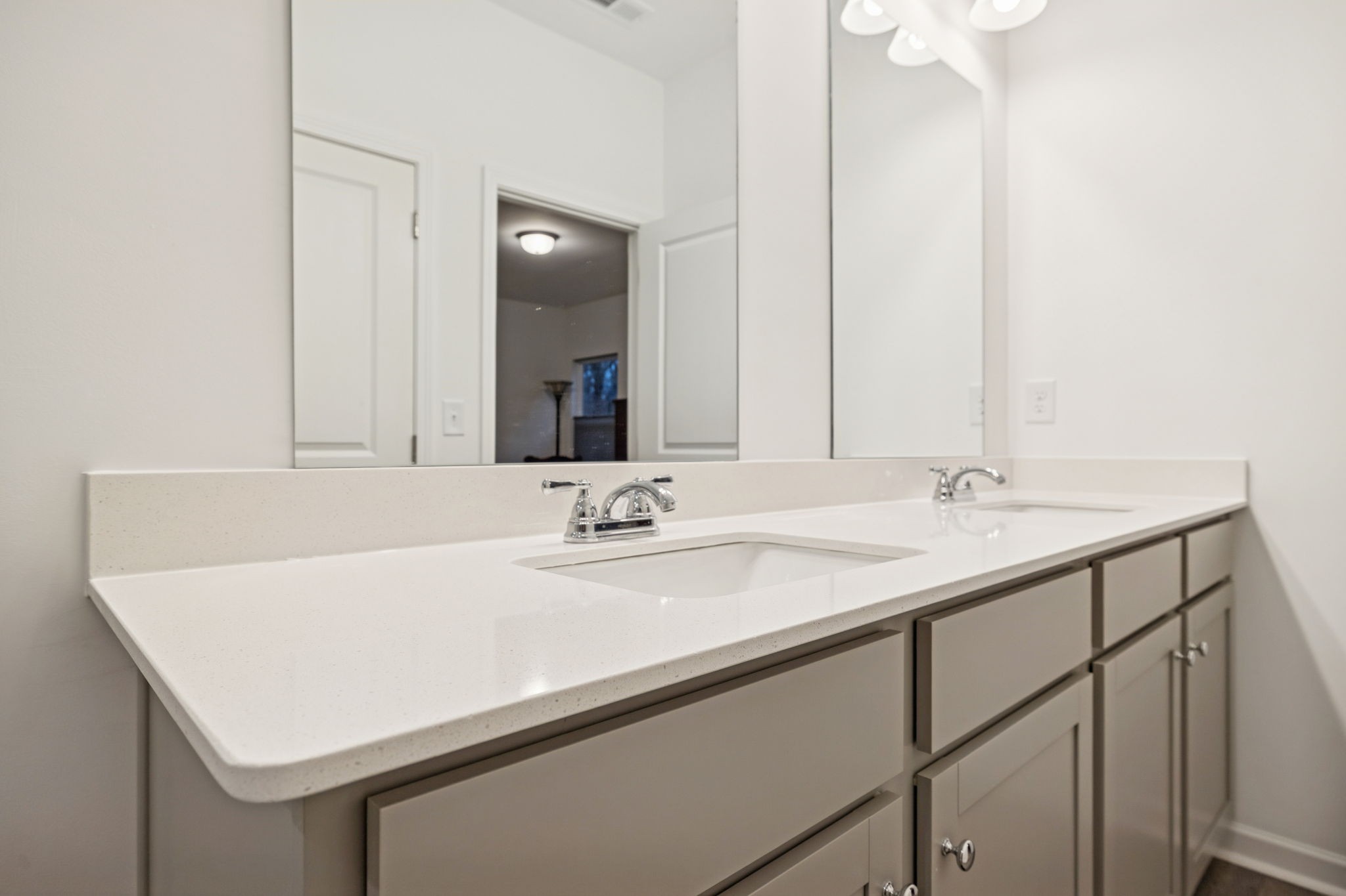 129 Ironhorse Way Dickson, TN 37055 - Photo 15 of 35 a bathroom with a sink and a mirror