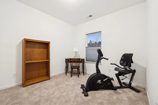 an empty room with closet area