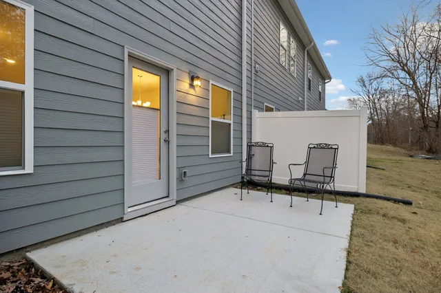 a view of a backyard of the house