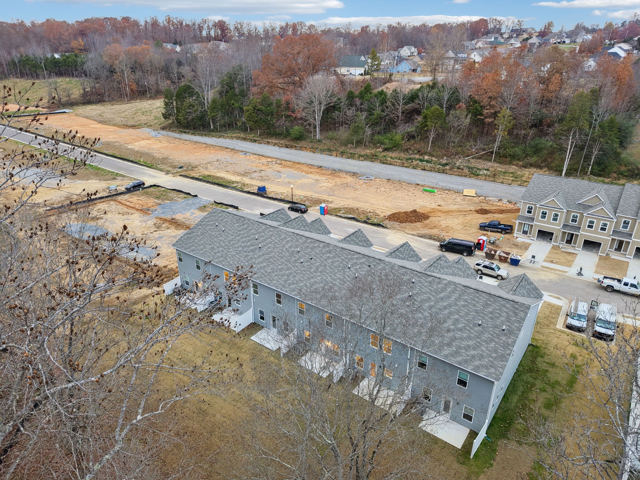 129 Ironhorse Way Dickson, TN 37055 - Photo 34 of 35 an aerial view of a house with a yard and mountain view in back