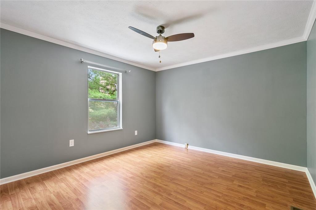 2003 Timber Trail Imperial, PA 15126 - Photo 15 of 18 wooden floor in an empty room with a window