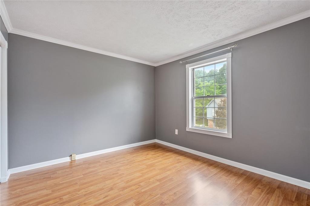 2003 Timber Trail Imperial, PA 15126 - Photo 17 of 18 an empty room with wooden floor and windows