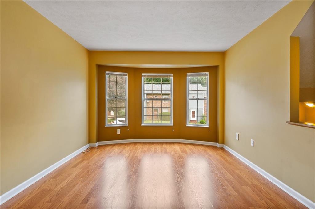 2003 Timber Trail Imperial, PA 15126 - Photo 2 of 18 a view of an empty room with wooden floor and a window